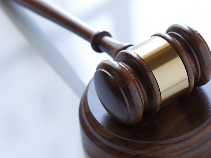 Stock image of gavel resting on table