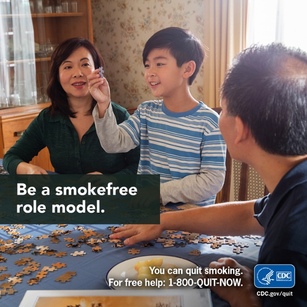 Image of a family with caption "Be a Smokefree Role Model"