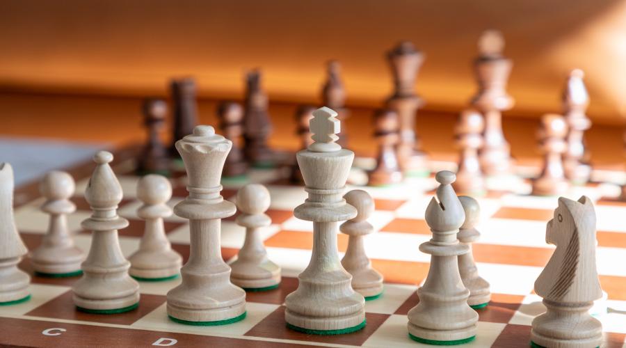 close-up of chess pieces on a chess board