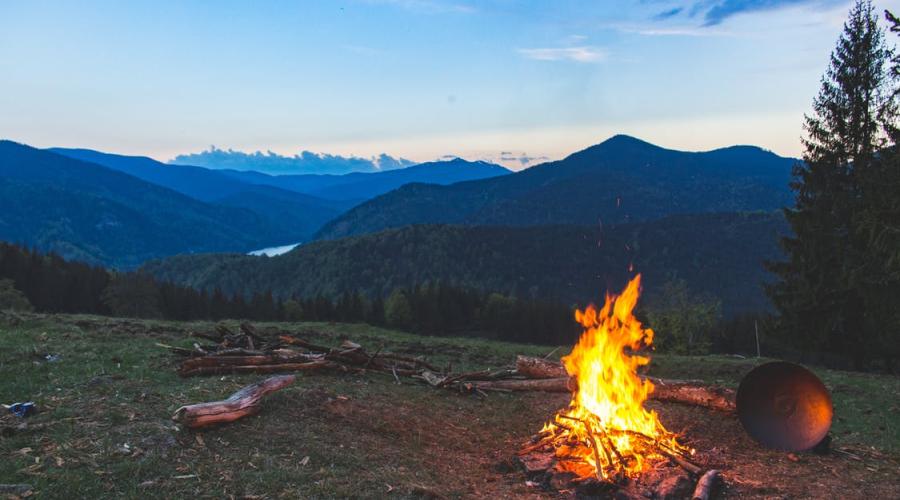 Picture of campfire near mountains